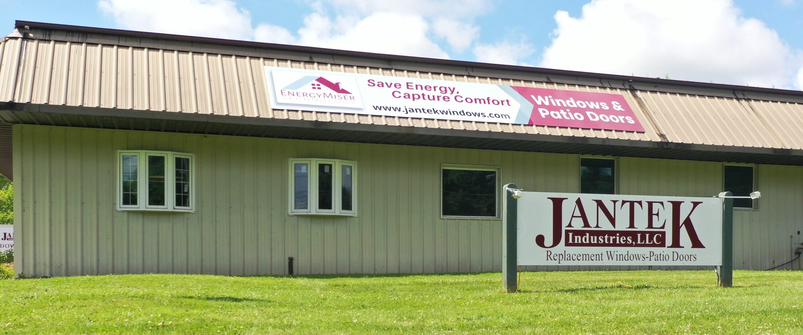 Exterior view of Jantek Industries signs at the factory & showroom