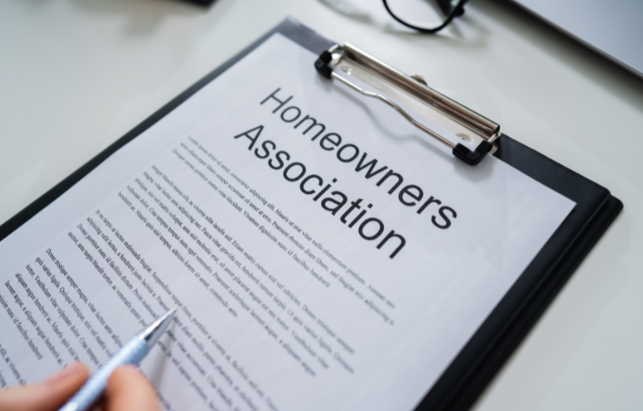 Homeowners Association paperwork on clipboard
