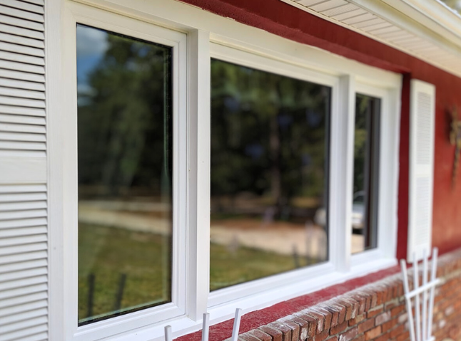 Slider windows with fixed center picture window