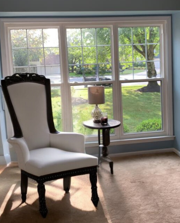 interior view of white double hung windows with grids on top